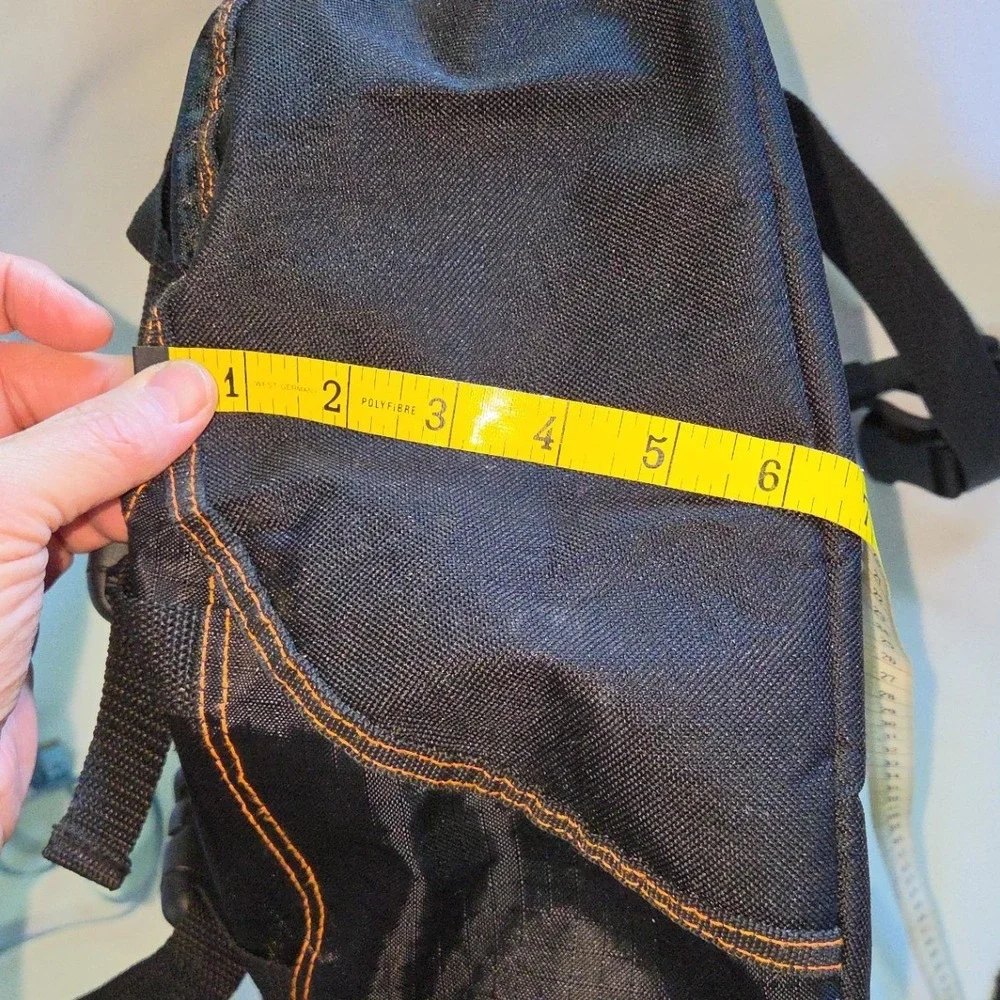 Starter Sling Backpack Black Reflective Orange Stitch Bungee Bag